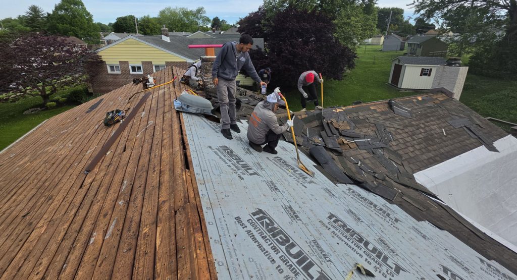 Tearing off old roof in Aston, PA