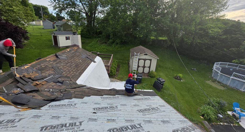 Tearing off old roof in Aston, PA
