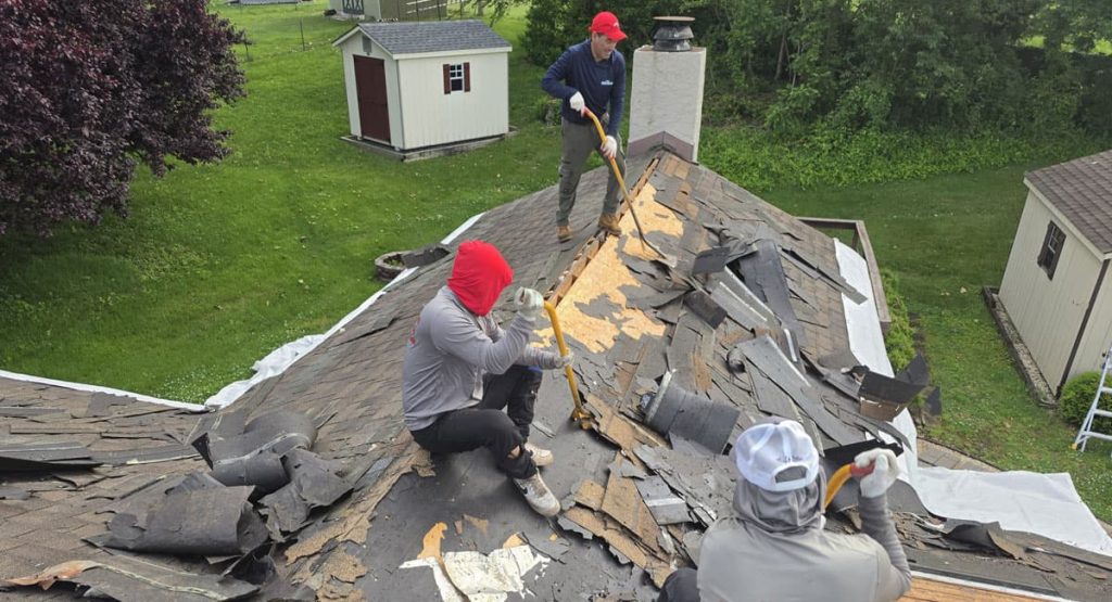 Tearing off old roof in Aston, PA