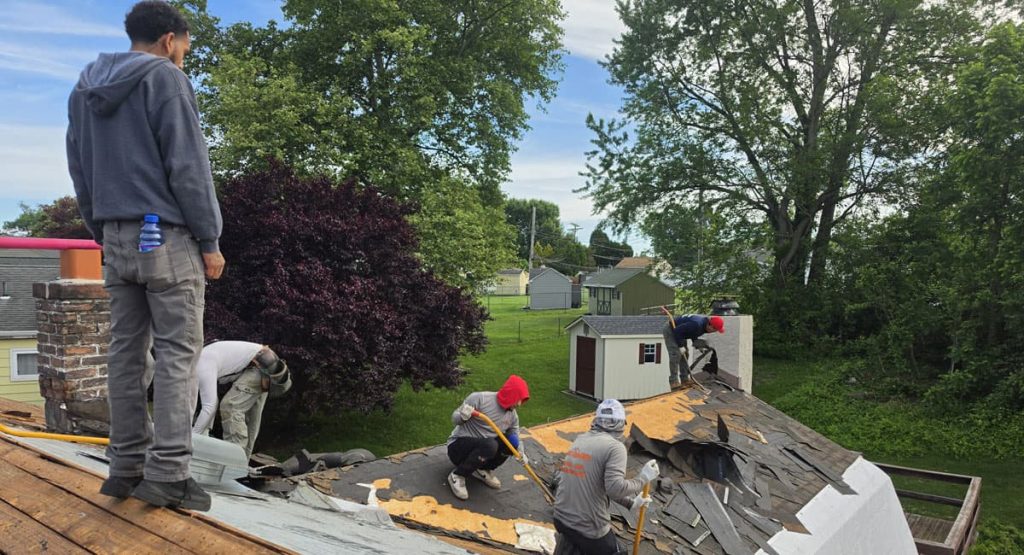 Tearing off old roof in Aston, PA