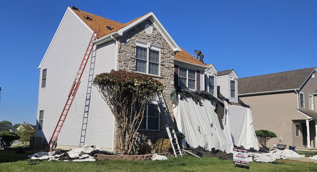 Tearing off the old roof in Smyrna, DE