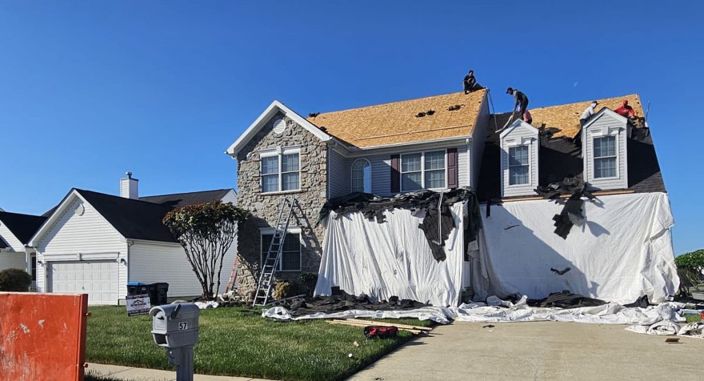 Tearing off the old roof in Smyrna, DE