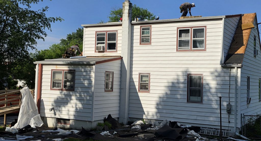 Tearing off the old roof in Chichester, PA