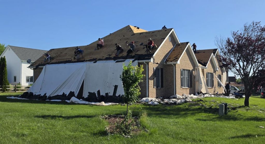 Tearing off the old roof in Bear, DE
