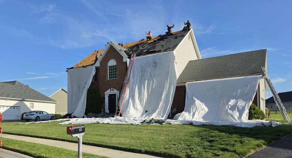 Tearing off the old roof in Bear, DE