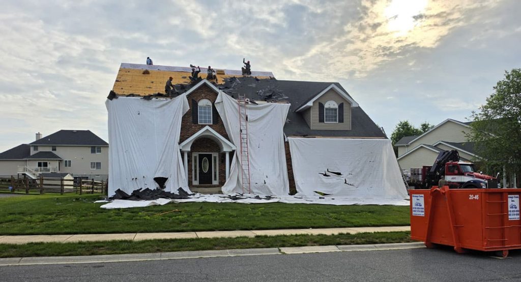 Tearing off the old roof in Bear, DE