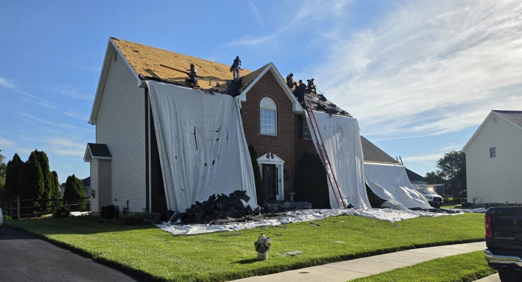 Tearing off the old roof in Bear, DE