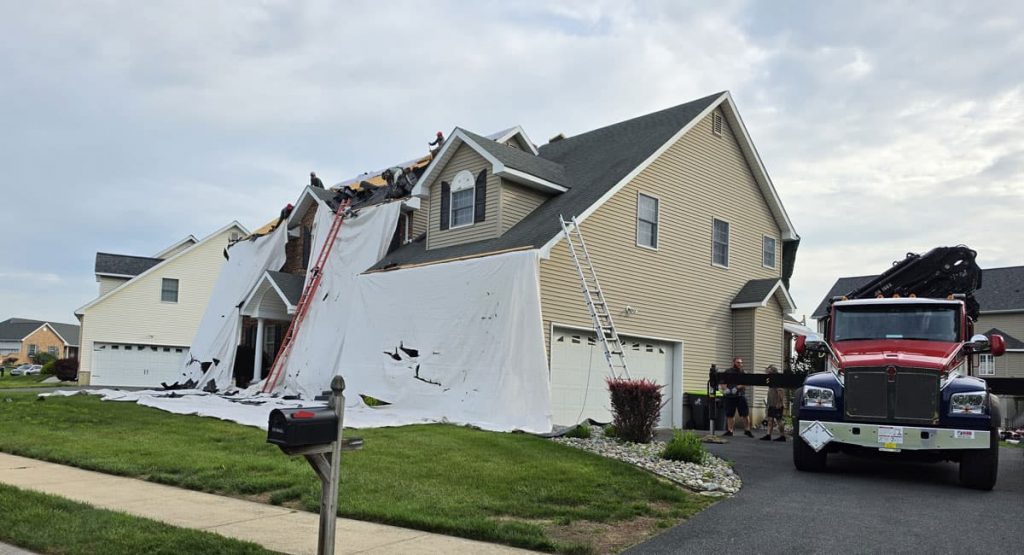 Tearing off the old roof in Bear, DE