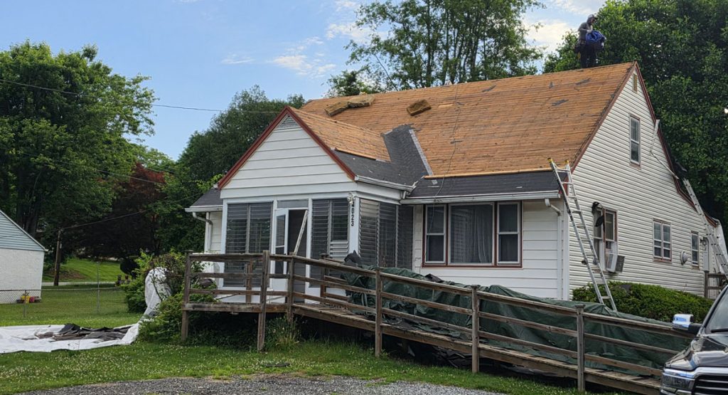 Tearing off the old roof in Chichester, PA