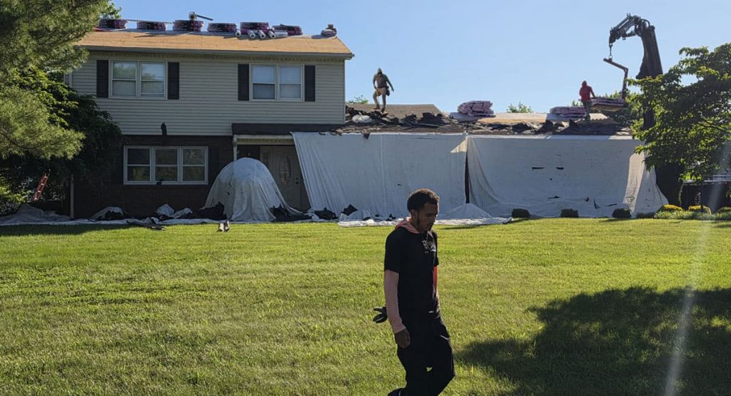 Tearing off the old roof in Newark, DE