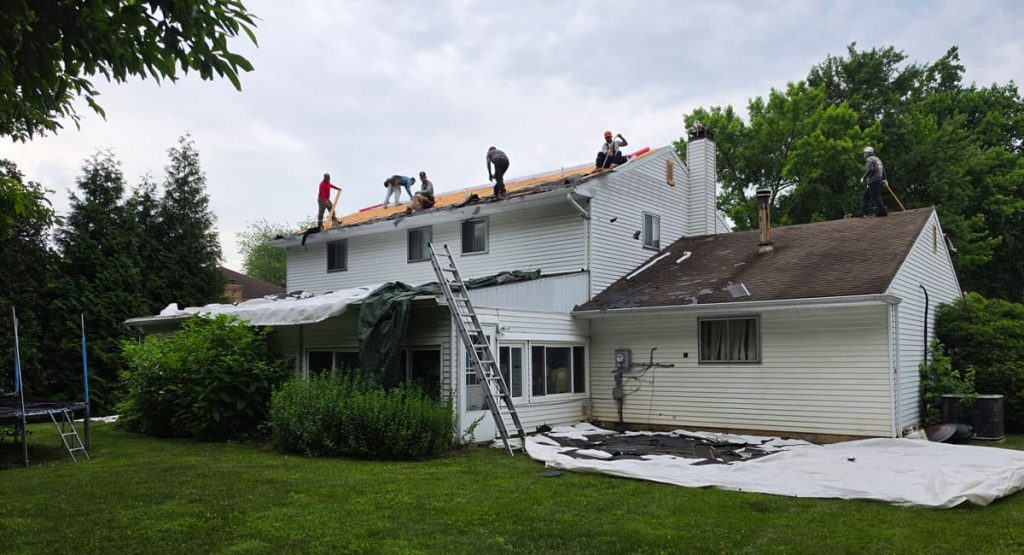 Tearing off old roof in Wilmington, DE