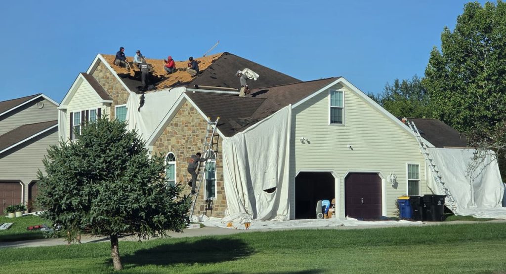 Tearing off the old roof in Magnolia, DE