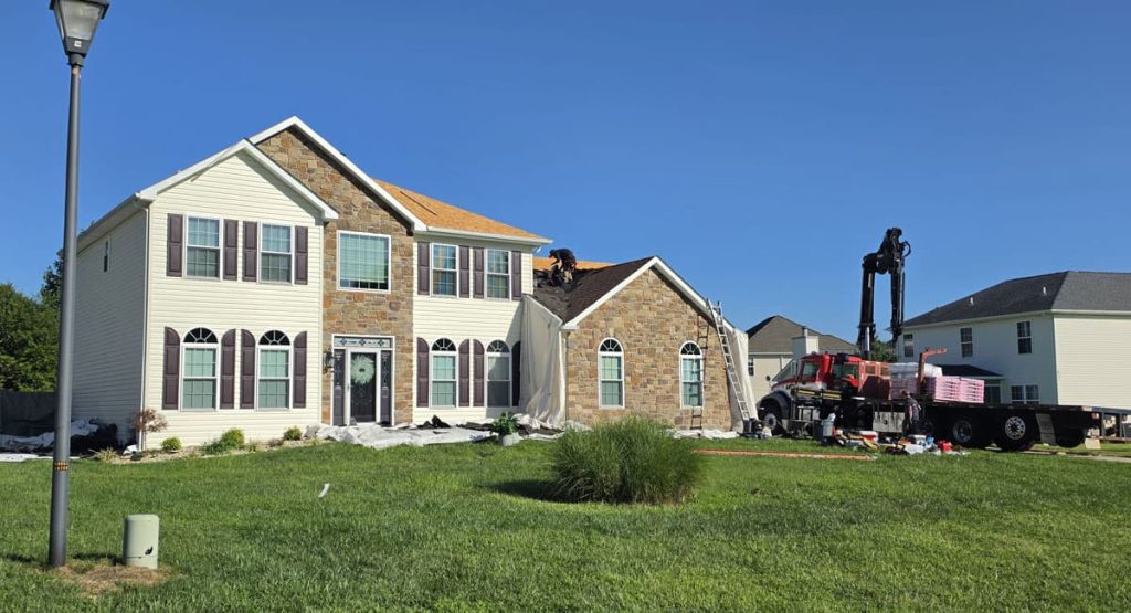 Tearing off the old roof in Magnolia, DE