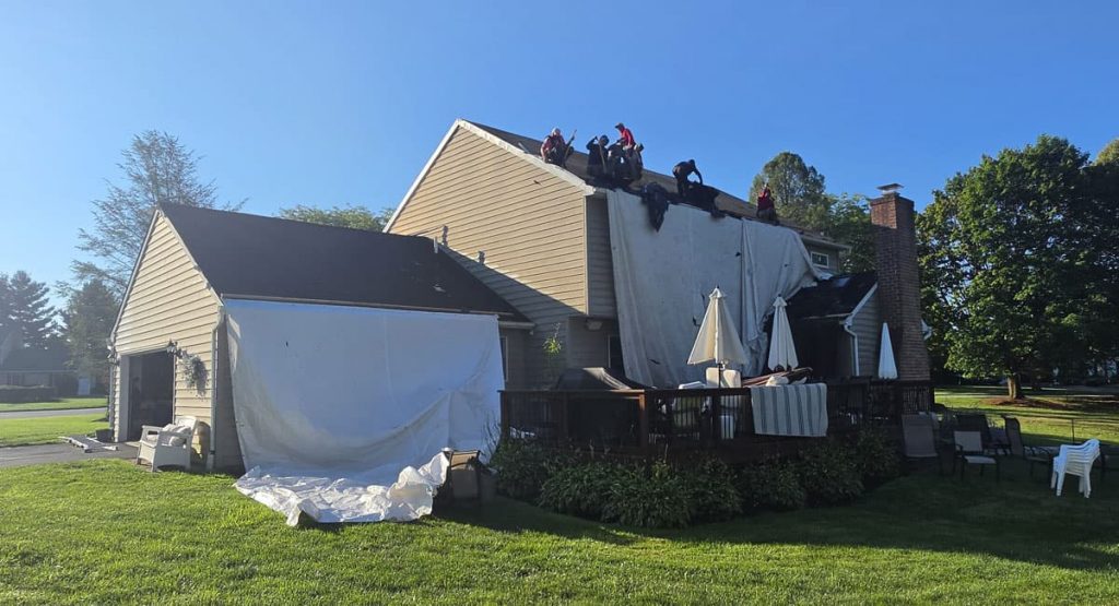 Tearing off the old roof in Malvern, PA