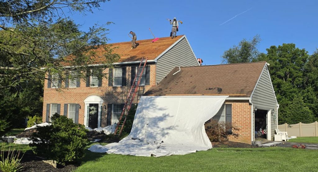 Tearing off the old roof in Malvern, PA