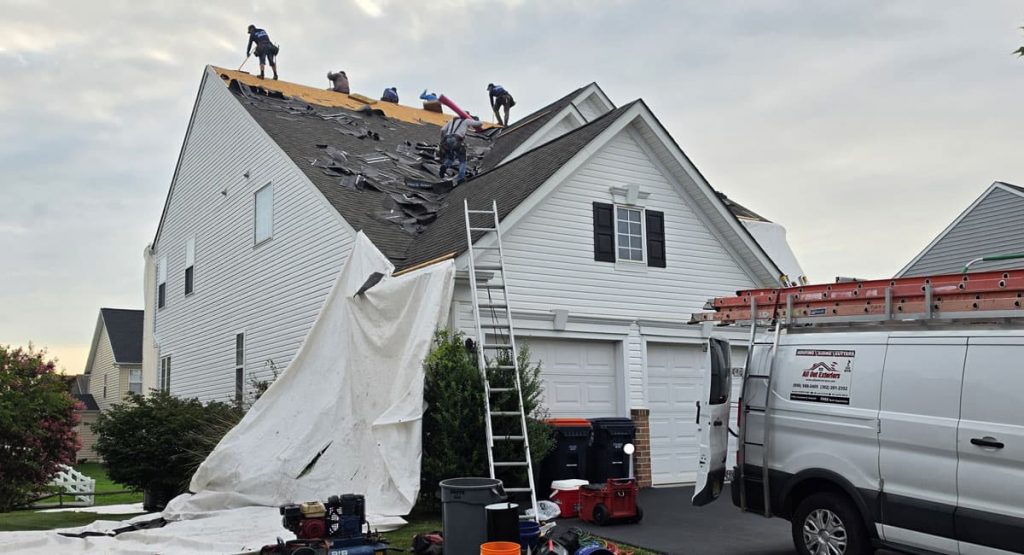 Tearing off old roof in Middletown, DE