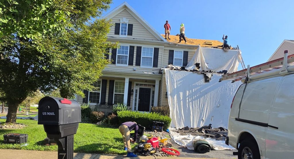 Tearing off old roof in Middletown, DE