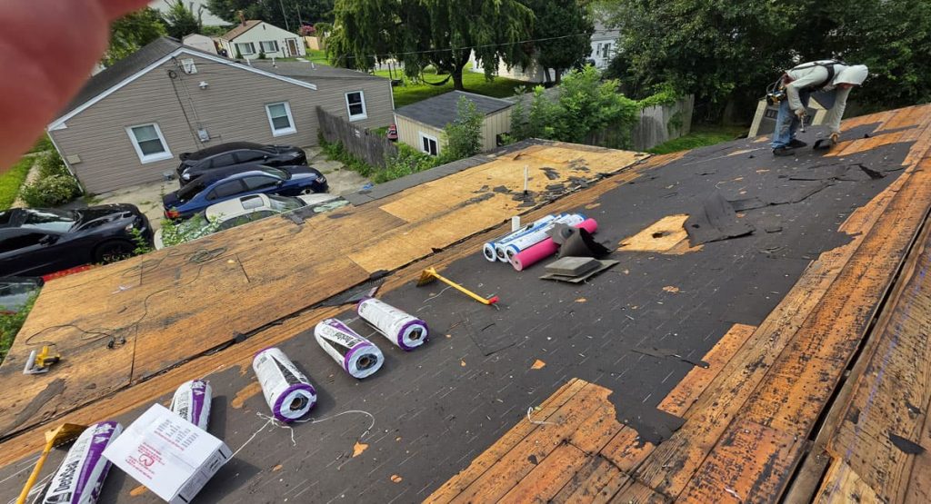 Tearing off the old roof in New Castle, DE