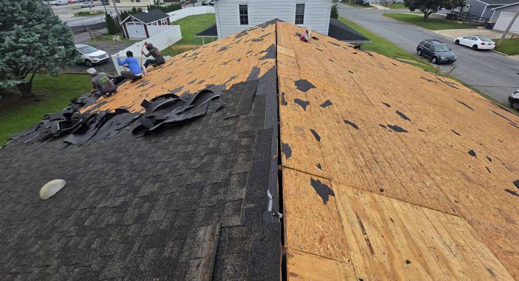 Tearing off old roof in Smyrna, DE