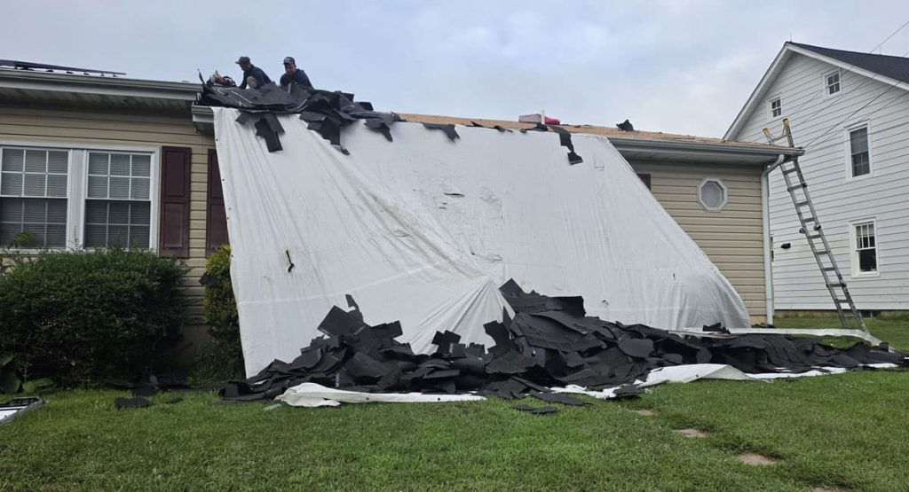 Tearing off old roof in Smyrna, DE