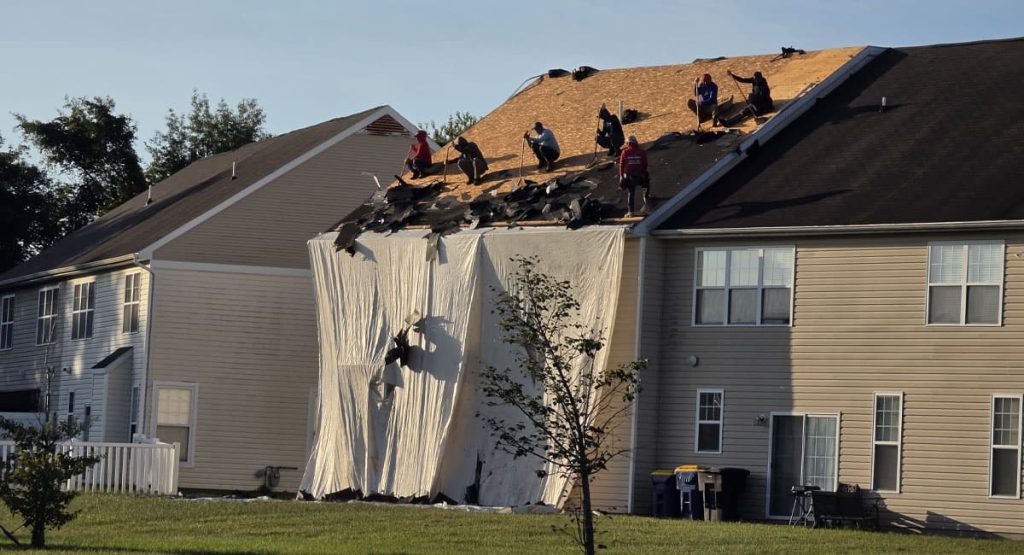 Tearing off the old roof in Dover, DE