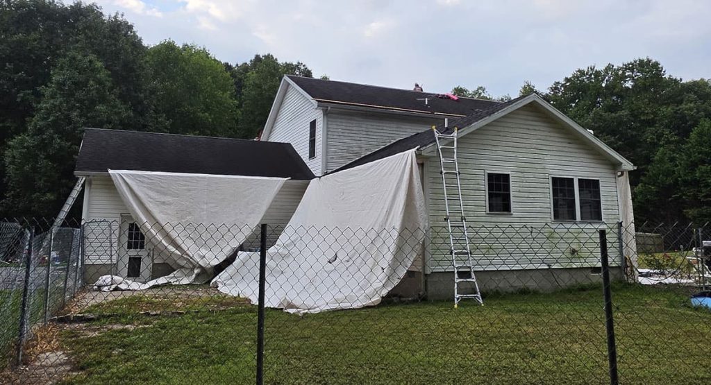 Tearing off the old roof in Greenwood, DE