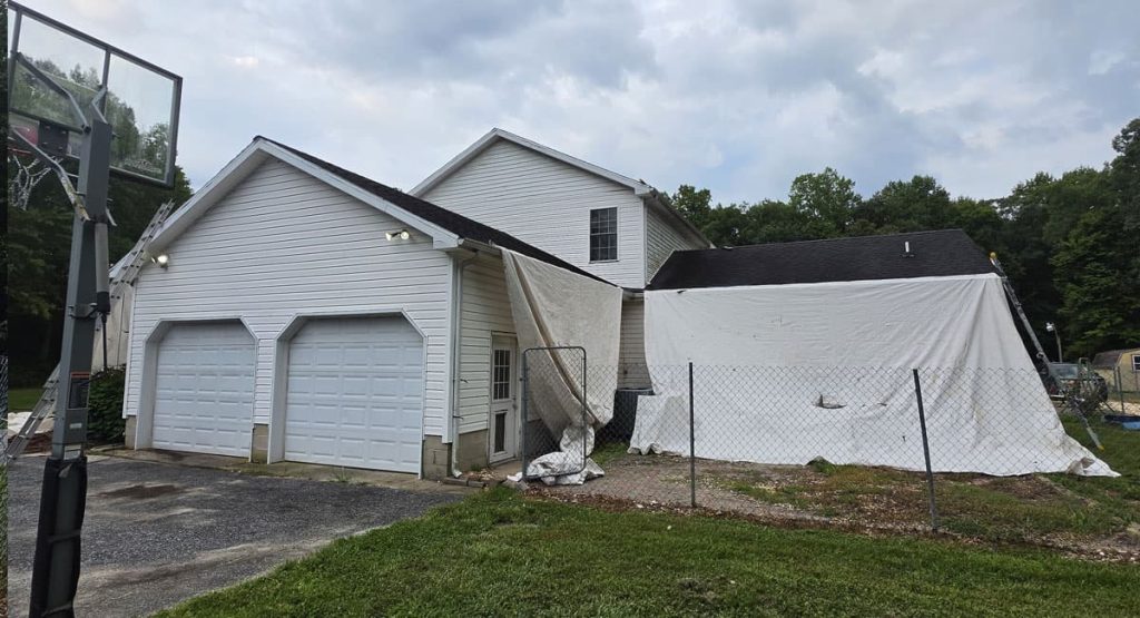 Tearing off the old roof in Greenwood, DE