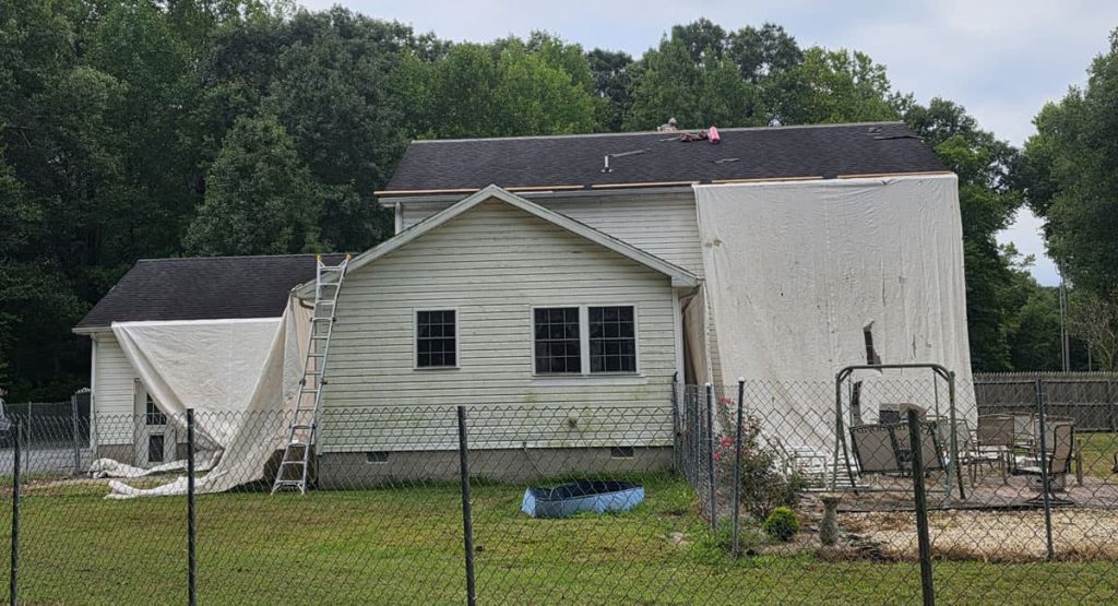 Tearing off the old roof in Greenwood, DE