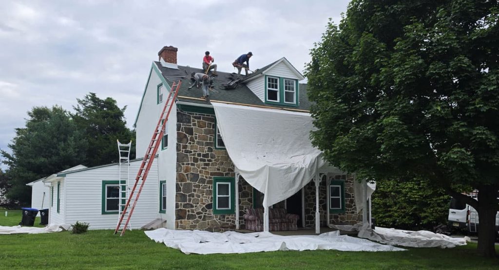 Tearing off old roof in Marcus Hook, PA