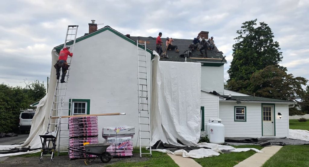 Tearing off old roof in Marcus Hook, PA