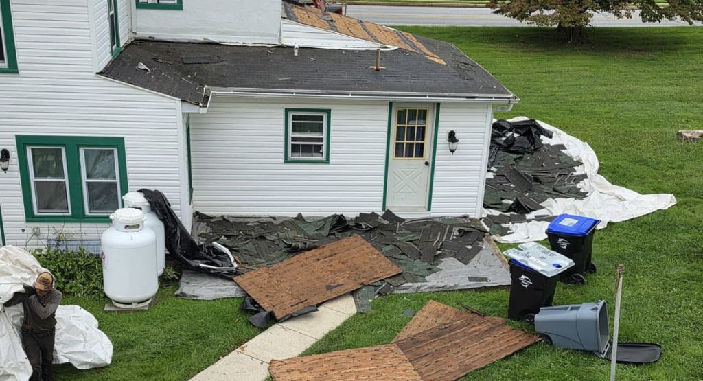 Tearing off old roof in Marcus Hook, PA